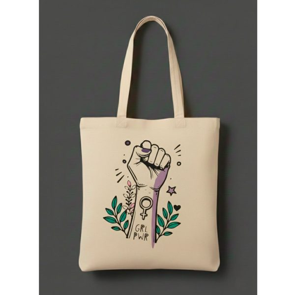 Tote bag de color crudo con diseño de ilustración femenina y lema GirlPower.